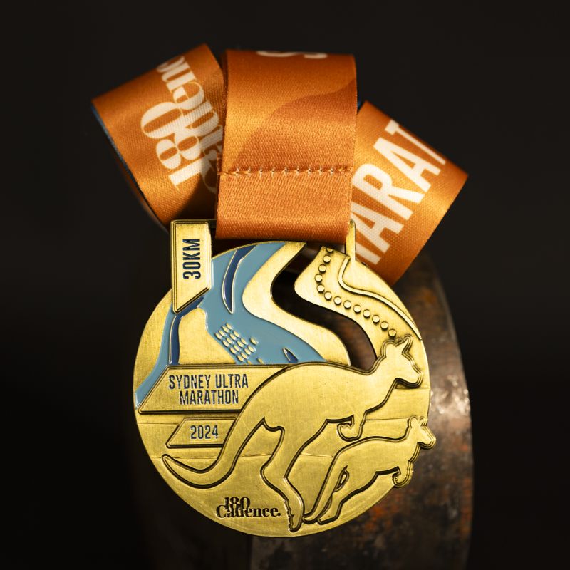 Sydney Ultra Marathon custom event medal with antique gold finish.