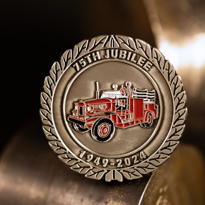 Custom Southern Rugby Football Club challenge coin in antique gold finish, with the club's logo in the centre. The logo is coloured with enamel.