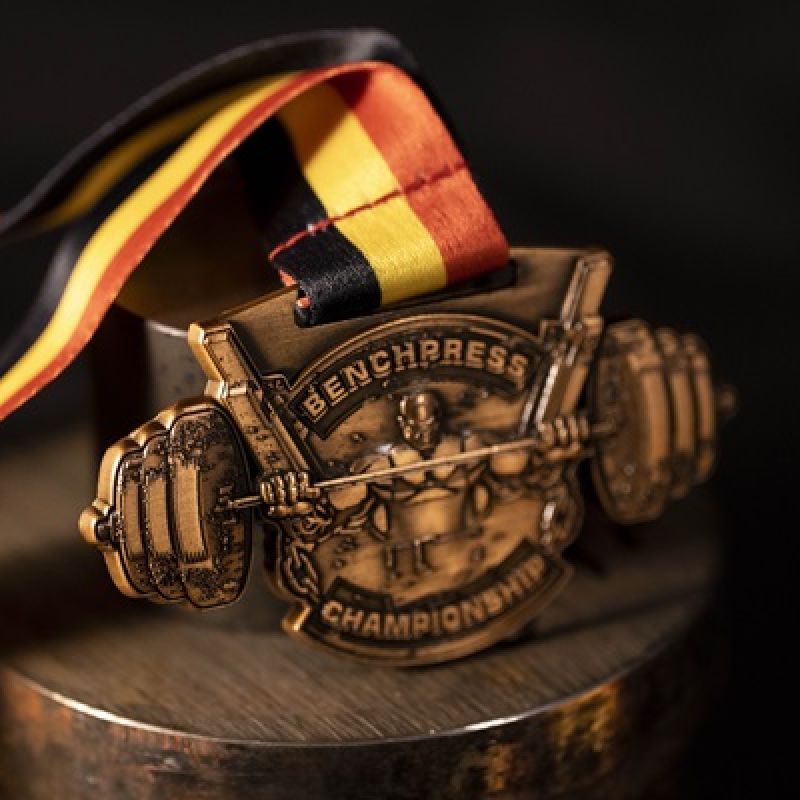 Metal Benchpress Championship custom event medal with an antique silver finish. The medal features a custom shape..