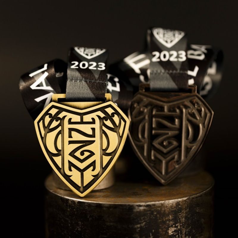 Metal Baseball New Zealand custom event medal with a bright gold finish. The medal features cut-out details.