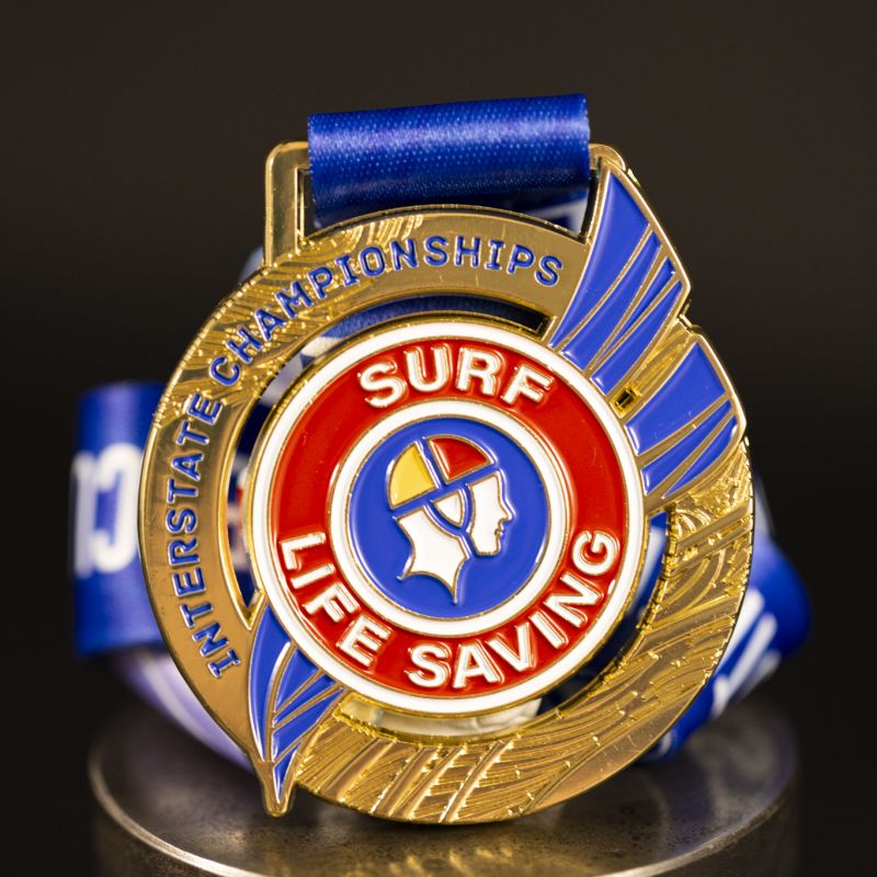 Surf Life Saving Australia Medal. This medal has a bright gold base.
