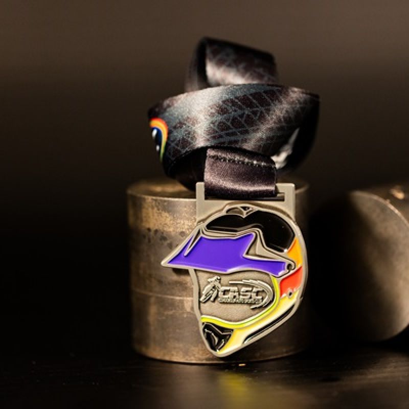 Metal Condobolin Auto Sports Club custom event medal with an antique silver finish. The event's logo is coloured in with enamel. 
